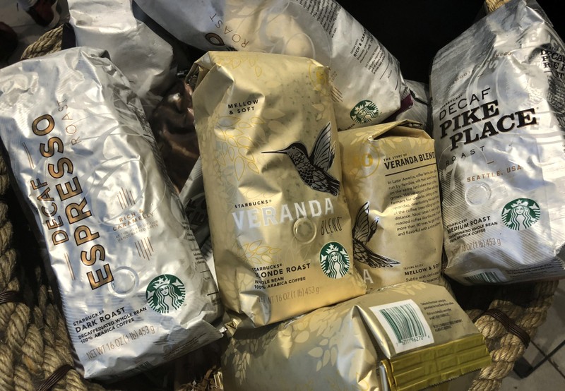 Packages of Starbucks coffee for sale are seen displayed at a Starbucks coffee shop in New York City