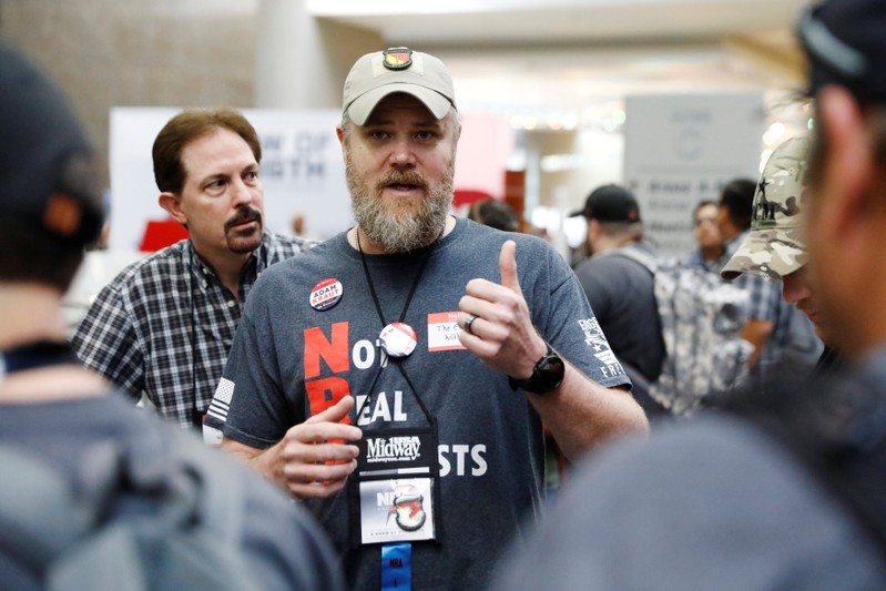 Gun rights proponent and media personality Tim Harmsen speaks with supporters during the annual National Rifle Association (NRA) convention in Dallas, Texas