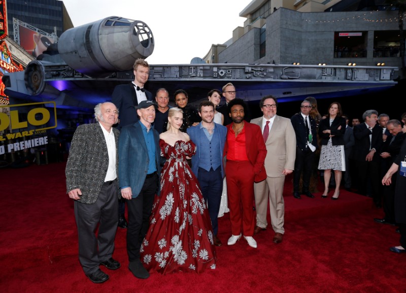 Director of the movie Howard poses with cast members Howard, Suotamo, Harrelson, Clarke, Newton, Ehrenreich, Waller-Bridge, Bettany, Glover and Favreau at the premiere for the movie 