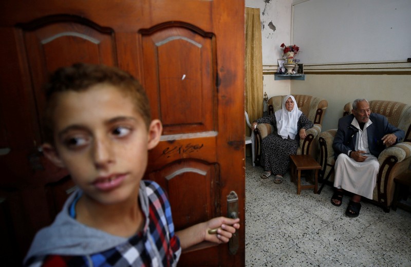 Palestinian refugees Saber Deeb and his wife Huda attend Reuters interview in Gaza City