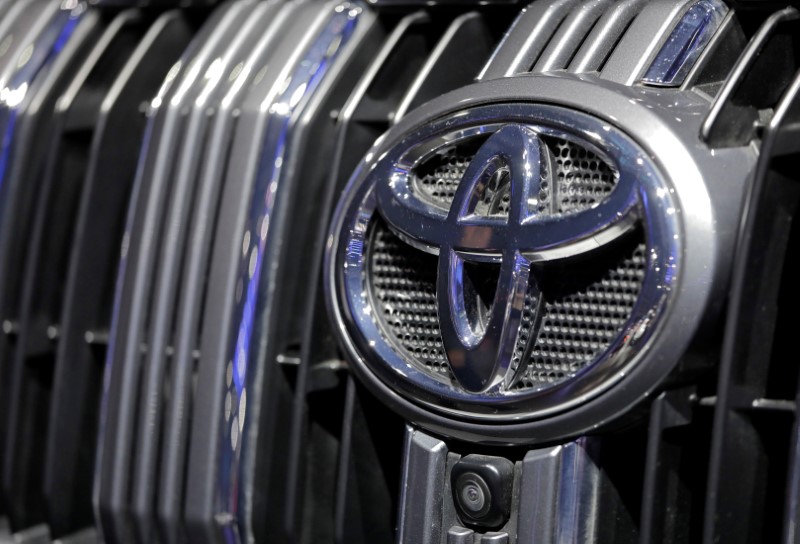 The Toyota company logo is pictured at the India Auto Show 2018 in Greater Noida