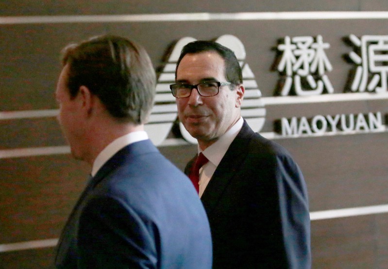U.S. Treasury Secretary Steven Mnuchin is seen as he and a U.S. delegation for trade talks with China arrive at a hotel in Beijing