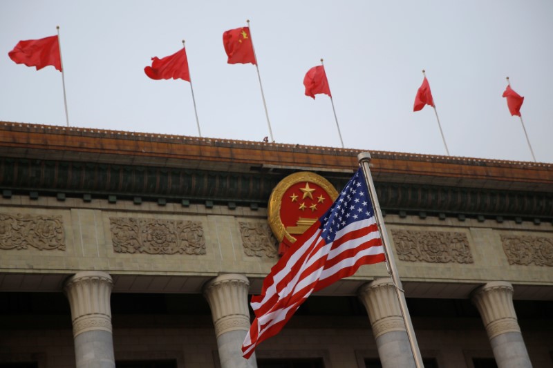 FILE PHOTO: A U.S. flag is seen during a welcoming ceremony in Beijing