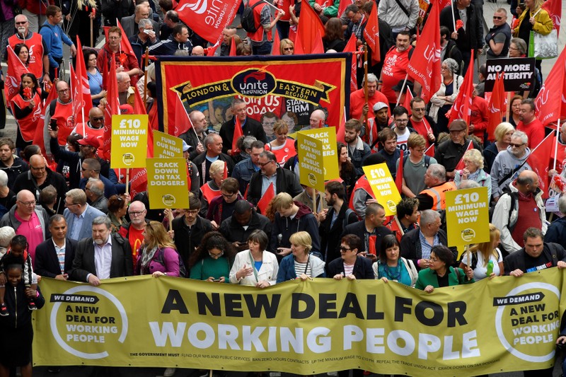 Demonstrators march in a public sector workers protest, organised by the Trades Union Congress, as part of its ‘A New Deal for Working People’ campaign, in central London
