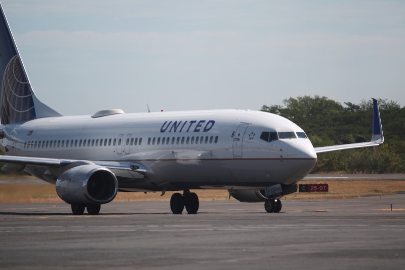 A United Airlines aircraft is seen at the Monsenor Oscar Arnulfo Romero International Airport in San Luis Talpa
