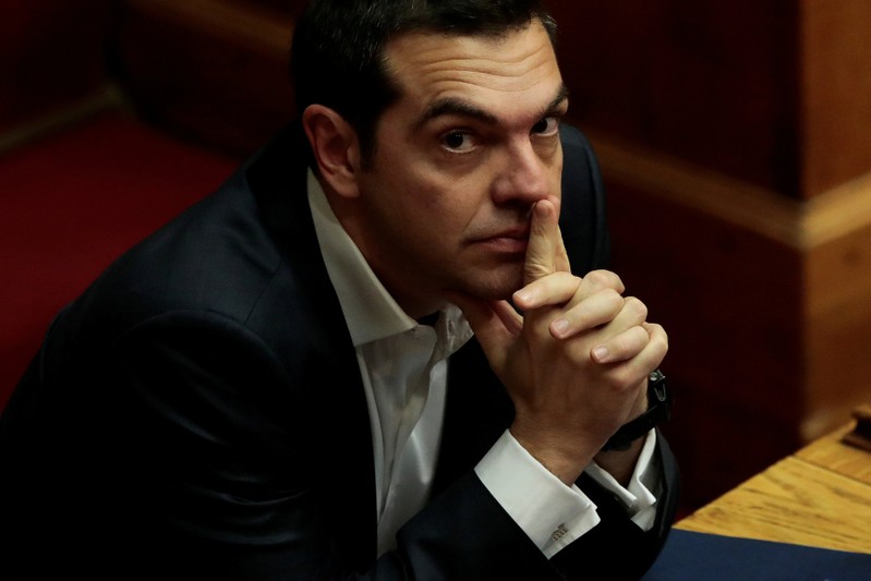 FILE PHOTO: Greek lawmakers vote on setting up committee to probe role of politicians in drug bribery case
