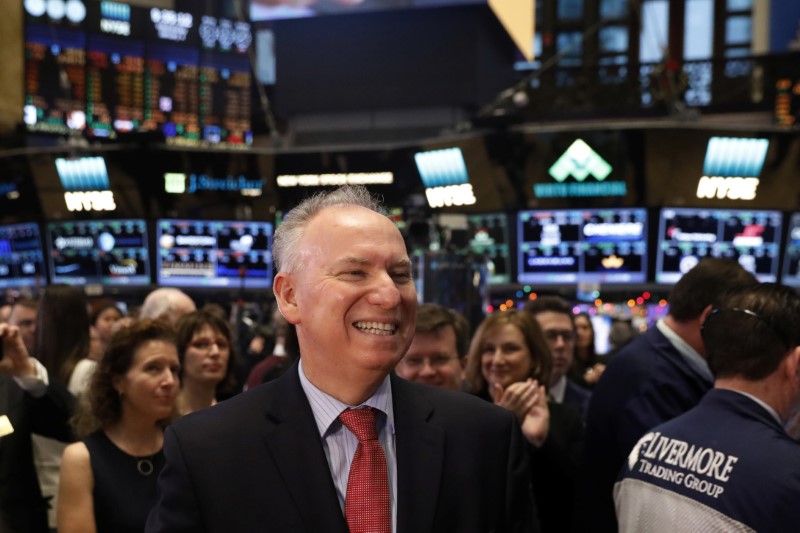 Xerox chief executive officer, Jeff Jacobson, smiles as he stands on the floor of the NYSE in New York