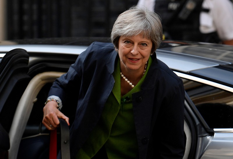 Britain's Prime Minister May returns to Downing Street from the Houses of Parliament in London, Britain