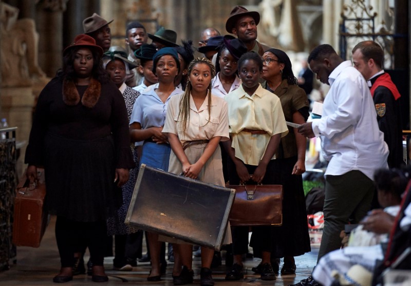 Performers from the HEbE Foundation charity perform during a Service of Thanksgiving to mark the 70th anniversary of the landing of the Windrush, at Westminster Abbey, London