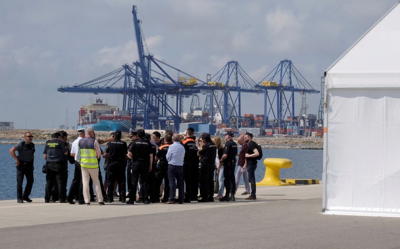 Police and Civil Guard staff hold a briefing next to the point of arrival of refugee vessel Aquarius and two other Italian ships expected tomorrow at the port of Valencia
