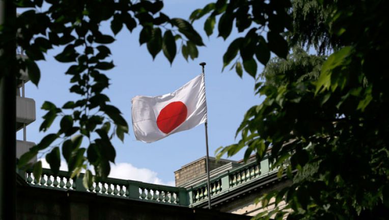 BOJ keeps policy steady, offers bleaker view on inflation