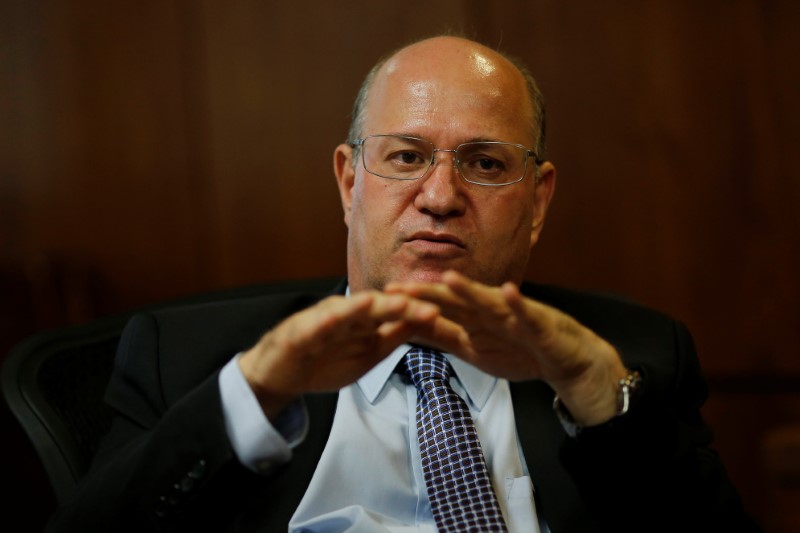 FILE PHOTO: Brazil's Central Bank President Ilan Goldfajn gestures during an interview with Reuters in Brasilia