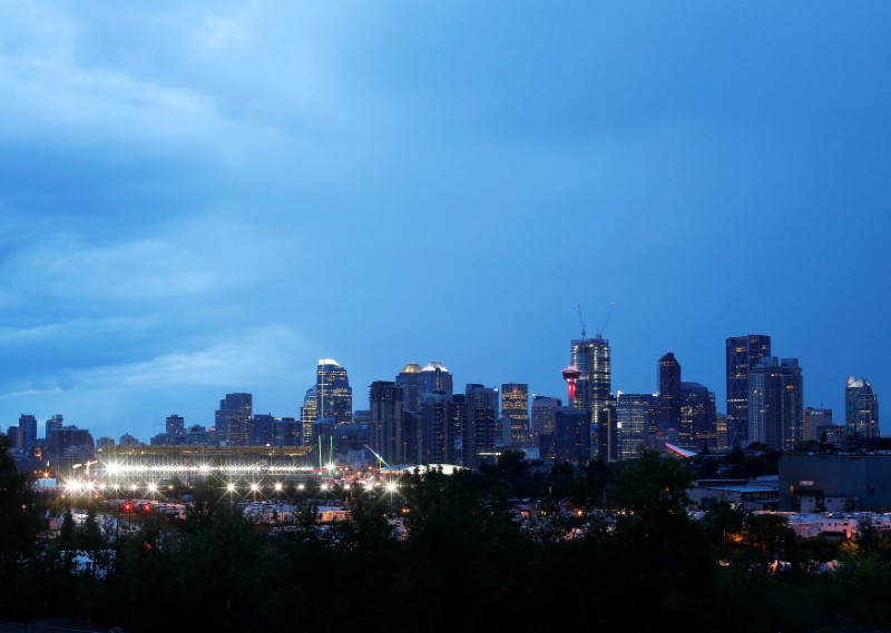 Calgary, the home of oil and gas in Canada and host to the Calgary Stampede rodeo, is pictured at dusk