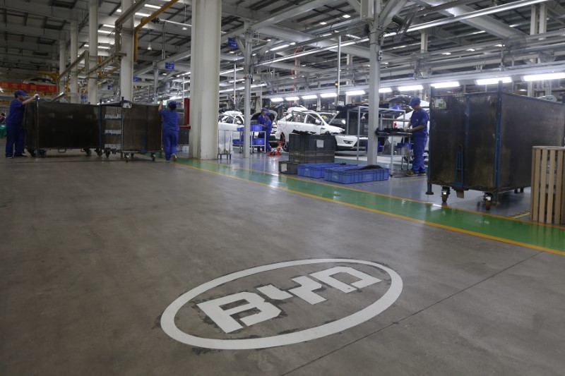 A logo of BYD is painted inside an assembly line of the automobile maker in Shenzhen