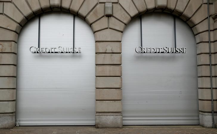 Windows of a Swiss bank Credit Suisse branch are closed during a May Day demonstration in Zurich