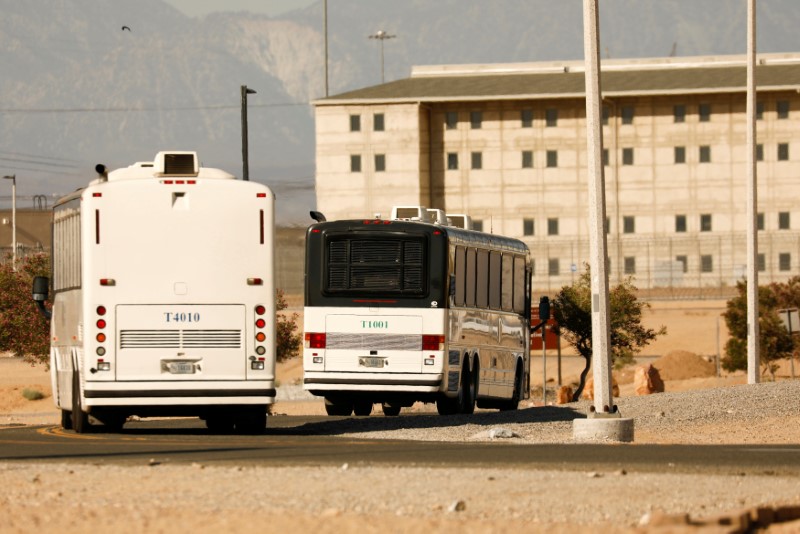 FILE PHOTO: Immigration and Customs Enforcement (ICE) detainees arrive at FCI Victorville federal prison in Victorville