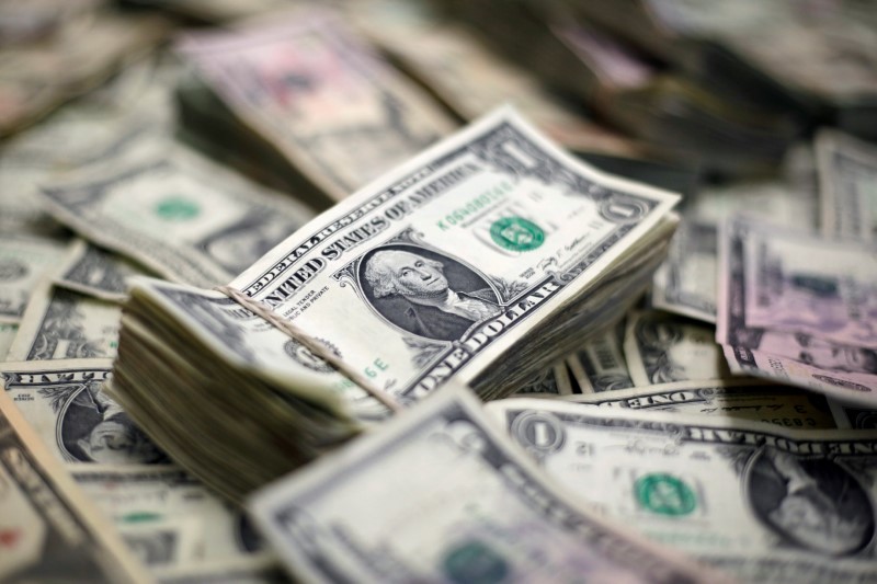 FILE PHOTO: U.S. Dollar banknotes are seen in this photo illustration