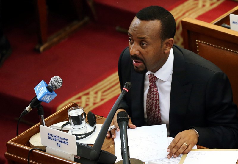 Ethiopia's newly elected Prime Minister Abiy Ahmed addresses the members of parliament inside the House of Peoples' Representatives in Addis Ababa