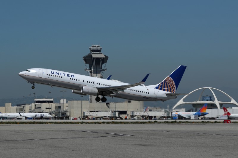 FILE PHOTO: United Airlines Boeing 737 plane takes off from Los Angeles International airport