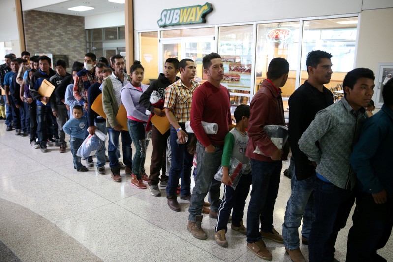 FILE PHOTO: Undocumented immigrants just released from detention through 