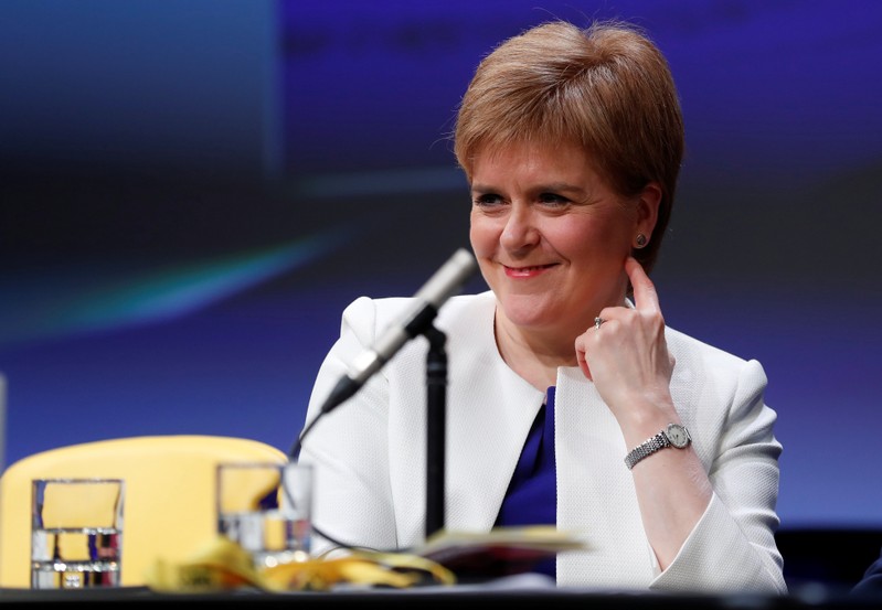 Scotland's First Minister Nicola Sturgeon, sits on stage at the Scottish National Party (SNP) conference in Aberdeen, Scotland