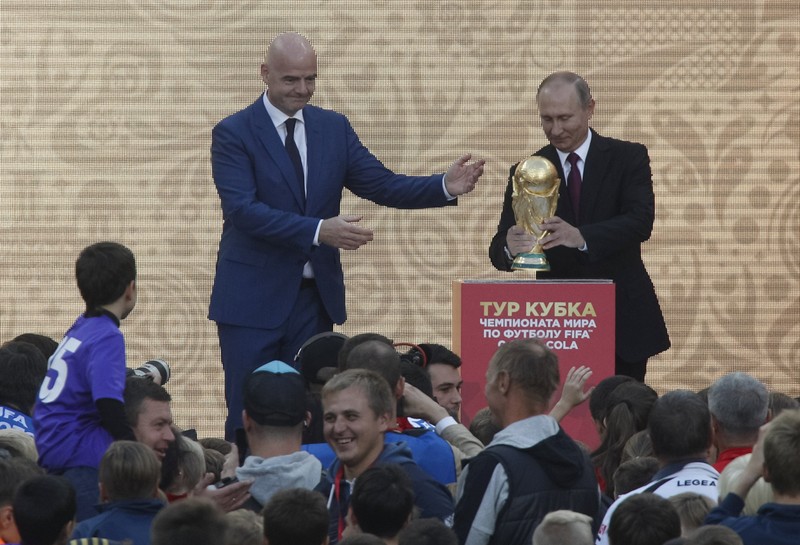 FILE PHOTO: FIFA President Infantino and Russian President Putin attend the FIFA World Cup Trophy Tour kick-off ceremony at the Luzhniki Stadium in Moscow