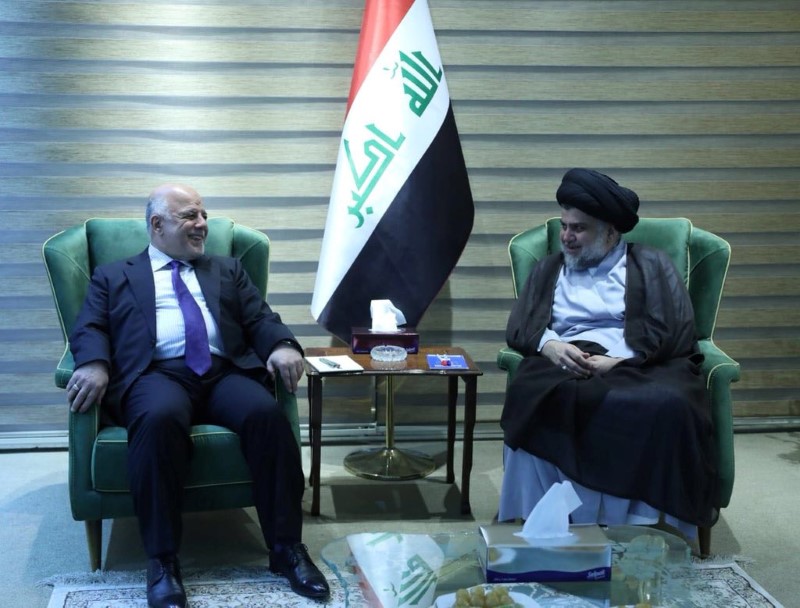 Iraqi Shi'ite cleric Moqtada al-Sadr meets with Iraqi Prime Minister Haider al-Abadi in Baghdad