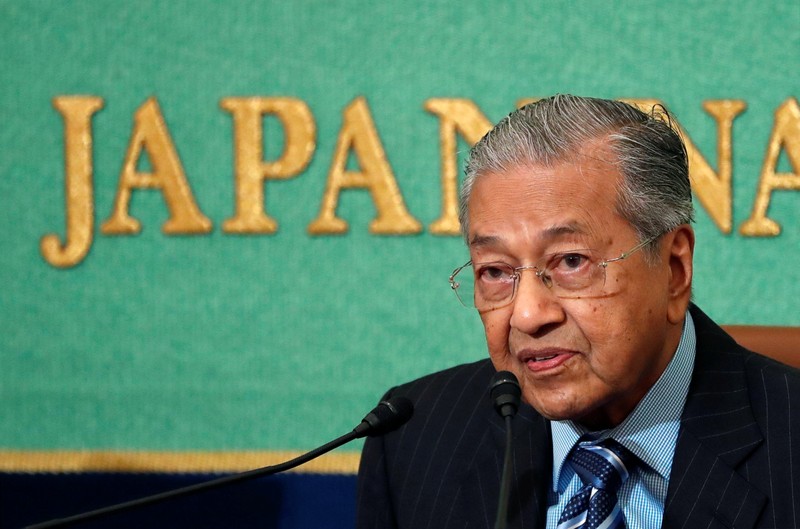 Malaysian Prime Minister Mahathir Mohamad attends a news conference at Japan National Press Club in Tokyo