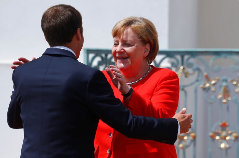 German Chancellor Merkel welcomes French President Macron at the German government guesthouse Meseberg Palace in Meseberg