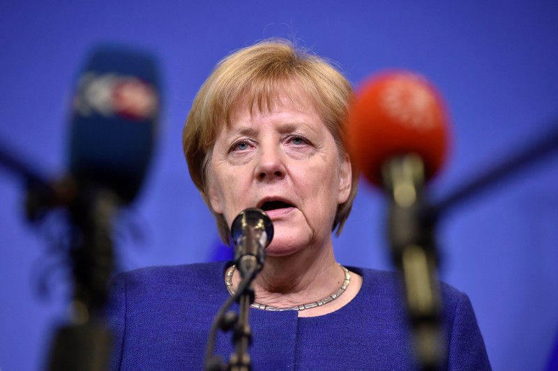German Chancellor Merkel talks to the press after an emergency EU leaders summit on immigration aat the EC in Brussels