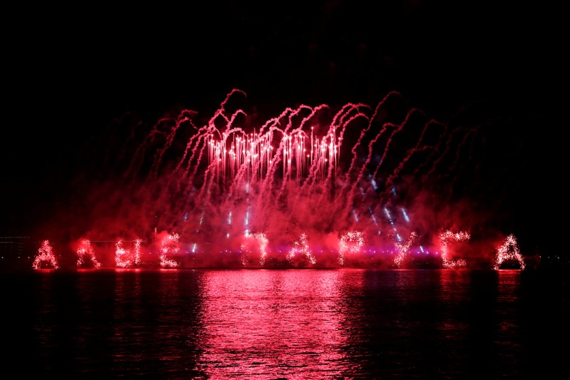 Fireworks explode along the Neva River, the during the Scarlet Sails festivities marking school graduation, in St. Petersburg