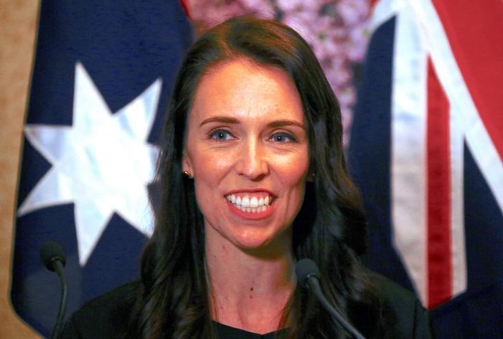 FILE PHOTO - New Zealand Prime Minister Jacinda Ardern smiles as she answers a question during a media conference in Sydney