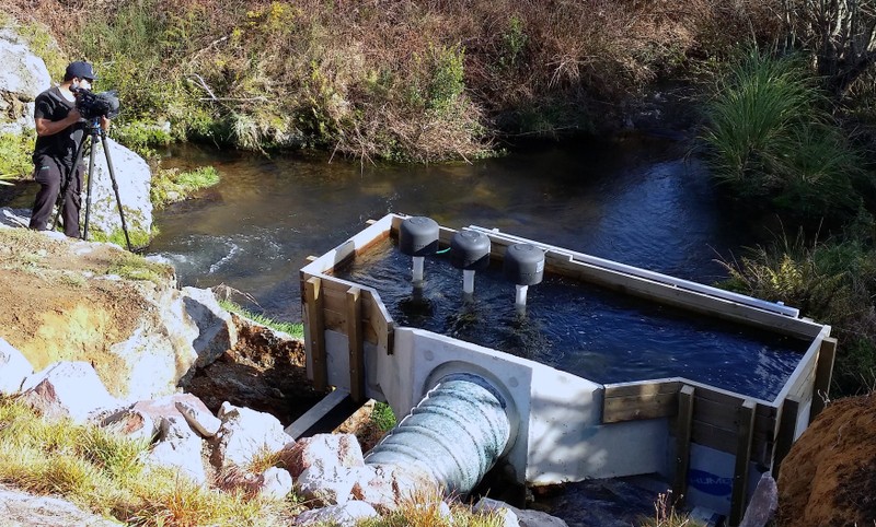 A supplied image shows a micro-hydro power unit that generates electricity to power the Marae and Iwi owned farming operation located on the Pokaitu stream at Kearoa Marae in New Zealand