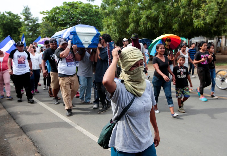 Demonstrators take part in funeral service of Agustin Ezequiel Mendoza, who was shot in recent protests against Nicaraguan President Daniel Ortega's government in Tipitapa, Nicaragua