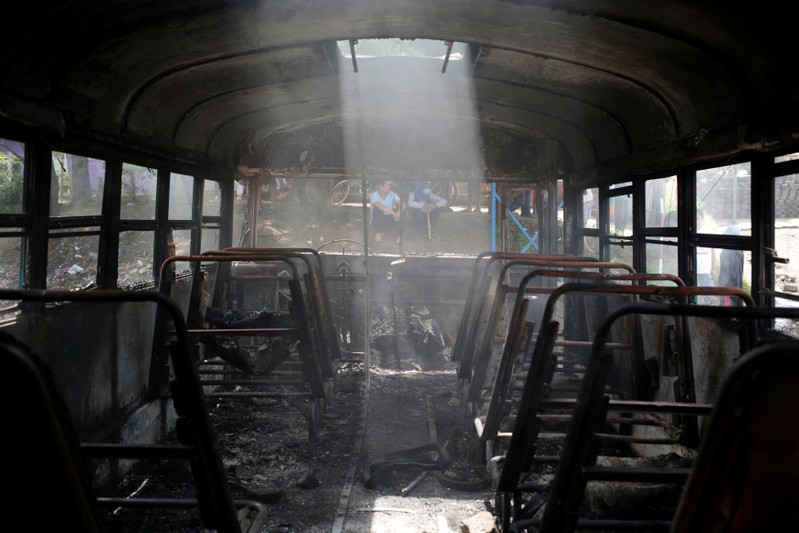 A burned bus is seen during a protest against Nicaragua's President Daniel Ortega's government in Tipitapa