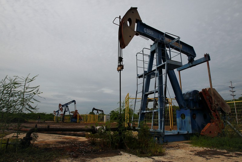 FILE PHOTO: Oil pumpjacks are seen in Lagunillas