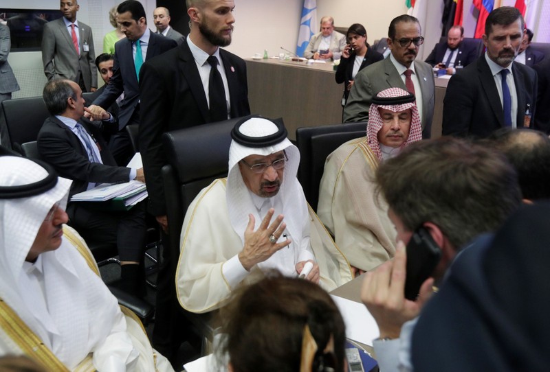 Saudi Arabia's Oil Minister al-Falih talks to journalists at the beginning of an OPEC meeting in Vienna