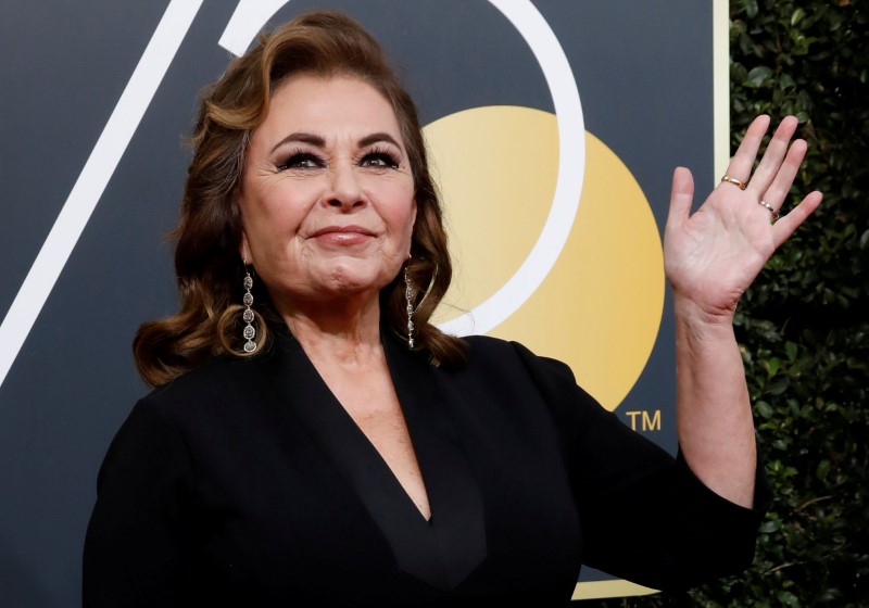 FILE PHOTO: Actress Roseanne Barr waves on her arrival to the 75th Golden Globe Awards in Beverly Hills