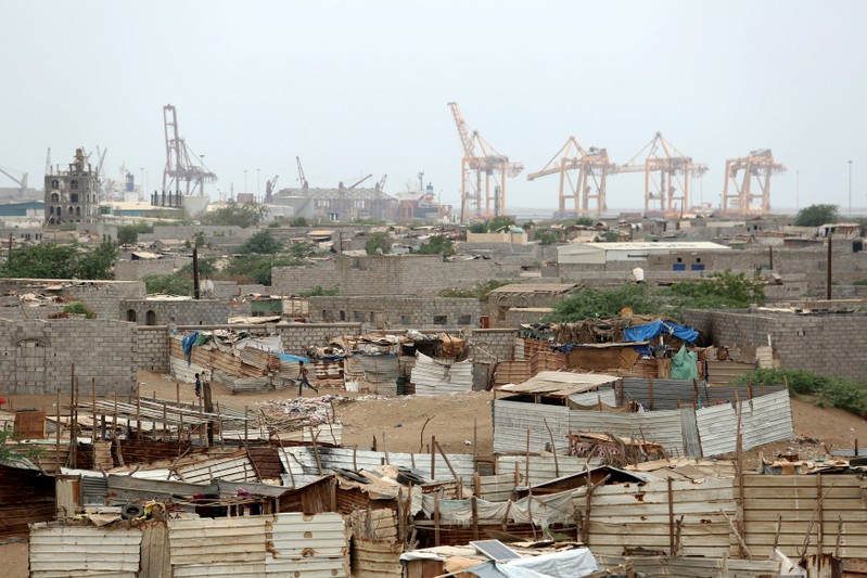 FILE PHOTO: Hodeidah port's cranes are pictured from a nearby shantytown in Hodeidah