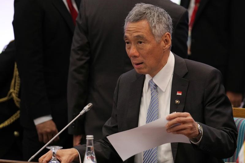 Singapore's PM Lee attends the opening session of the 31st ASEAN Summit in Manila, Prime Minister Lee Hsien Loong attends the opening session of the 31st ASEAN Summit in Manila