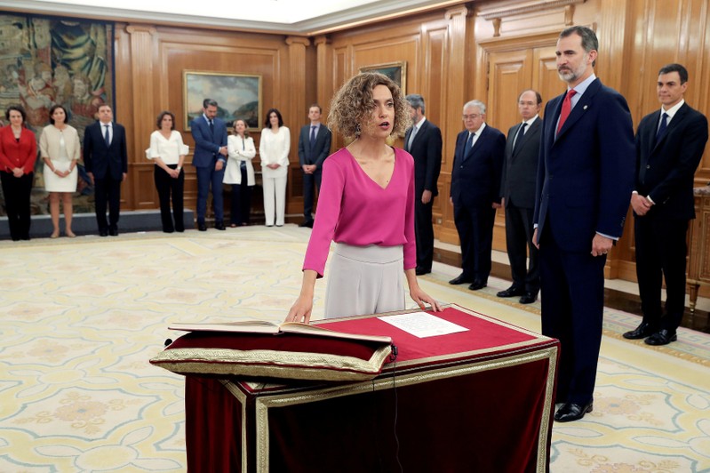 Spain's new Minister of Regional Administration Meritxell Batet takes oath during a swearing-in ceremony at the Zarzuela Palace outside Madrid