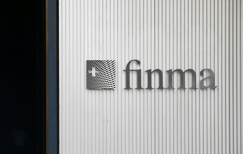 FILE PHOTO: The logo of Swiss Financial Market Supervisory Authority FINMA is seen outside their headquarters in Bern
