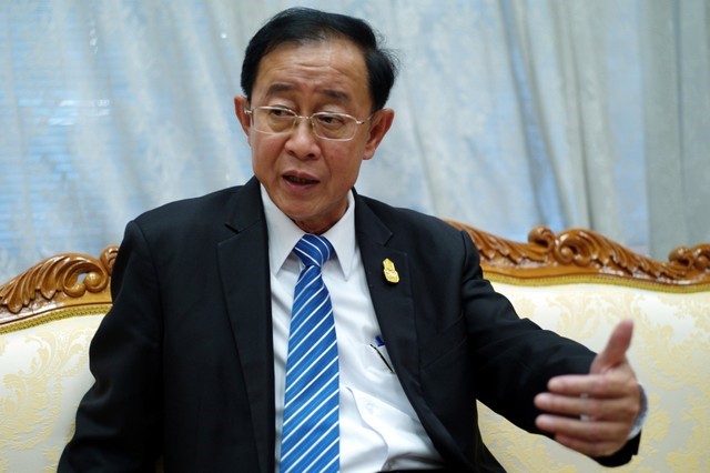 Thailand Transport Minister Arkhom Termpittayapaisith speaks during an interview with Reuters in Bangkok