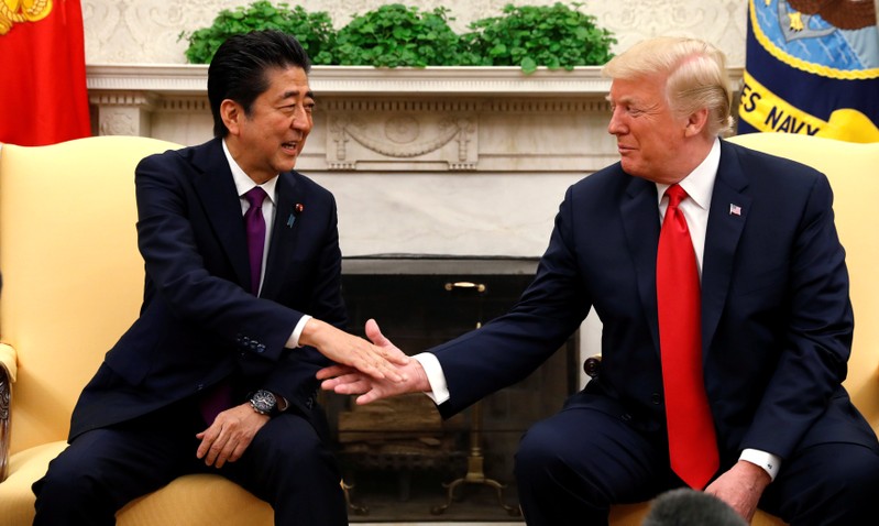 U.S. President Trump welcomes Japanese Prime Minister Abe at the White House in Washington