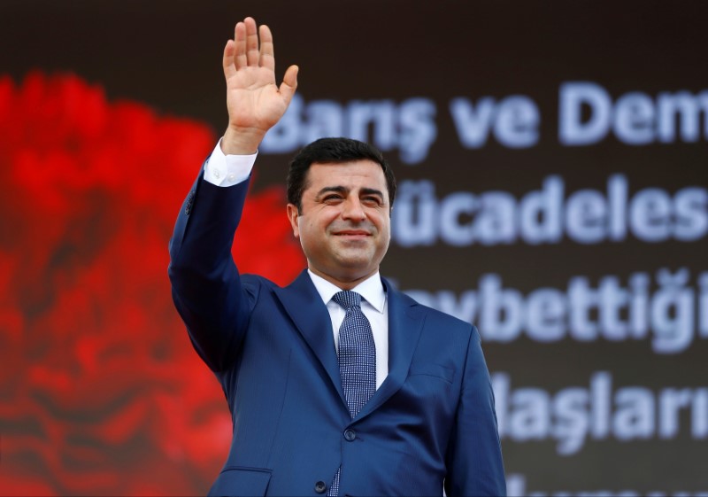 FILE PHOTO: The leader of Turkey's pro-Kurdish opposition Peoples' Democratic Party Demirtas greets his supporters during a rally in Istanbul