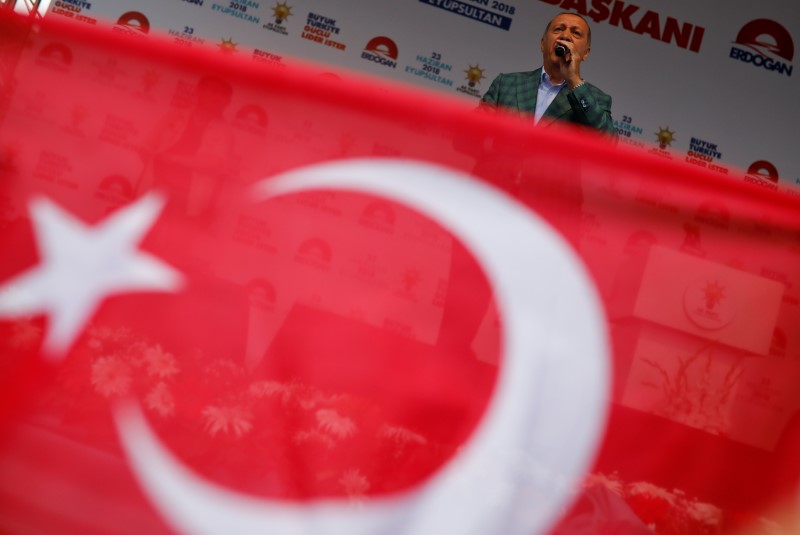 Turkish President Tayyip Erdogan addresses his supporters during an election rally in Istanbul