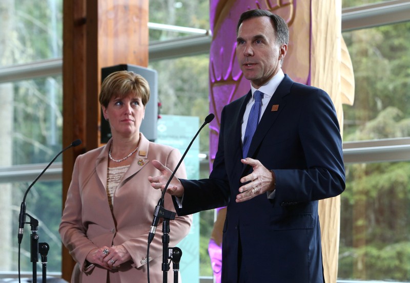 Canada's Minister of Finance Bill Morneau and Minister of International Development Marie-Claude Bibeau speak to media during the G7 Finance Ministers Summit in Whistler