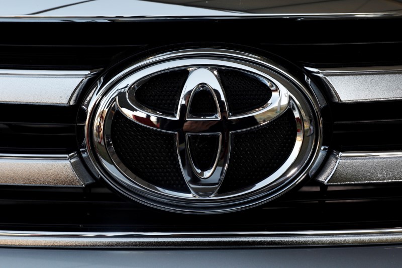 FILE PHOTO: A Toyota Motor Corp. logo is seen on a car at the International Auto Show in Mexico City