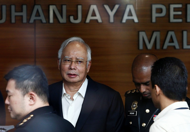 FILE PHOTO: Malaysia's former prime minister Najib Razak arrives to give a statement to the Malaysian Anti-Corruption Commission (MACC) in Putrajaya
