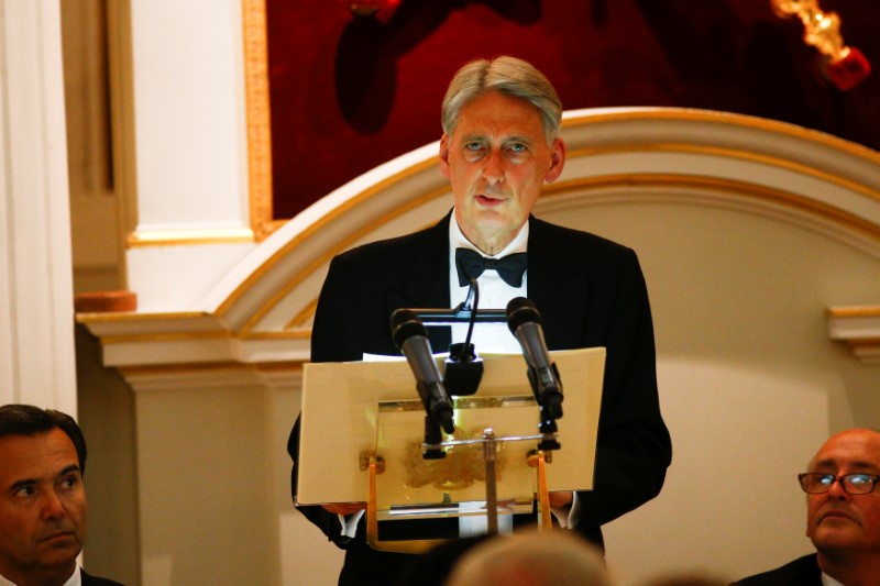 Britain's Chancellor of the Exchequer Philip Hammond delivers a speech at the Annual Mansion House dinner in London